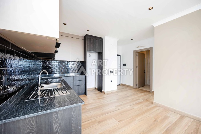 Квартира 1+1 с панорамным видом на море и горы, 53 кв.м. Кестель, Алания - Ракурс 32