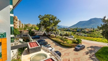 Просторная квартира 3+1 с видом на горы и море в престижном районе Кестель, Алания. - Ракурс 26