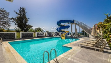 Просторная квартира 3+1 с видом на горы и море в престижном районе Кестель, Алания. - Ракурс 39