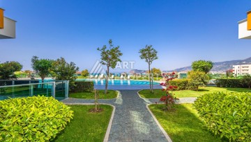 Просторная квартира 3+1 с видом на горы и море в престижном районе Кестель, Алания. - Ракурс 41