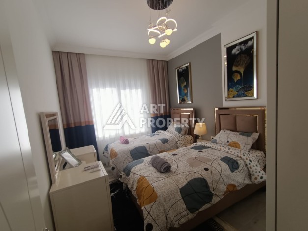 Просторная квартира 2+1 в современном комплексе района Махмутлар, всего в 350 метрах от моря. - Ракурс 2