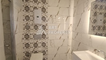 Просторная квартира 2+1 в современном комплексе района Махмутлар, всего в 350 метрах от моря. - Ракурс 25