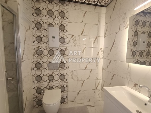 Просторная квартира 2+1 в современном комплексе района Махмутлар, всего в 350 метрах от моря. - Ракурс 24