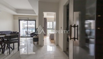 Меблированная квартира 1+1 в современном комплексе в престижном районе Махмутлар - Ракурс 2