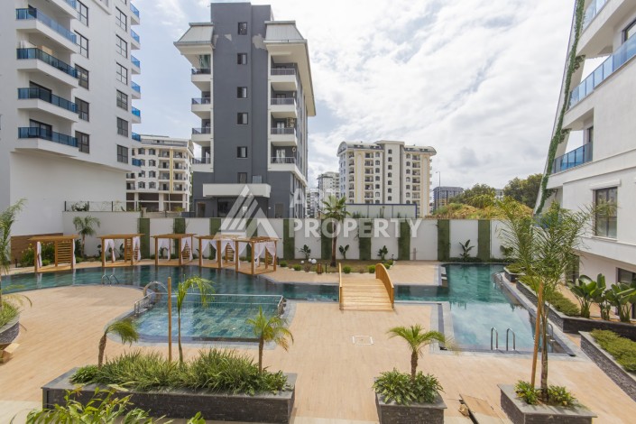 Меблированная квартира 1+1 в современном комплексе в престижном районе Махмутлар - Ракурс 5