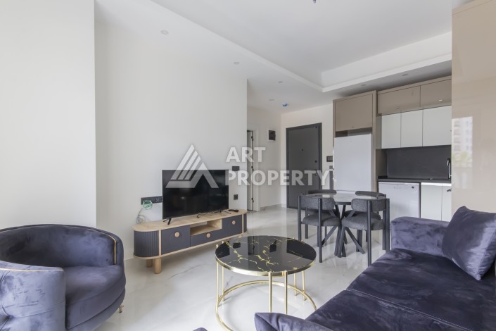 Меблированная квартира 1+1 в современном комплексе в престижном районе Махмутлар - Ракурс 12