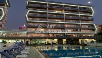 Квартира 1+1 в современной резиденции в Махмутларе, 50 кв.м. - Ракурс 2