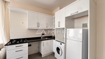 Квартира 1+1 в современной резиденции в Махмутларе, 50 кв.м. - Ракурс 19