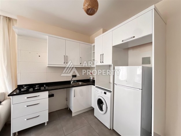 Квартира 1+1 в современной резиденции в Махмутларе, 50 кв.м. - Ракурс 18