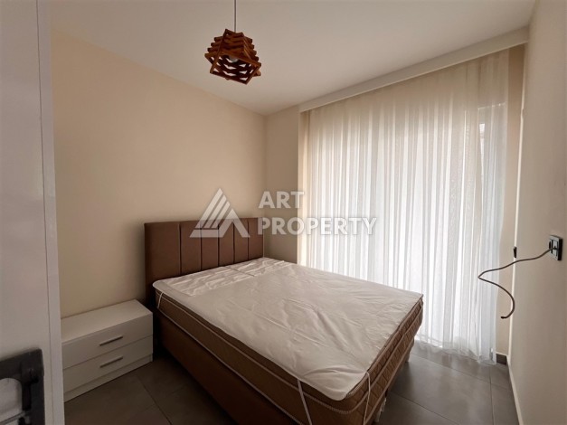 Квартира 1+1 в современной резиденции в Махмутларе, 50 кв.м. - Ракурс 19