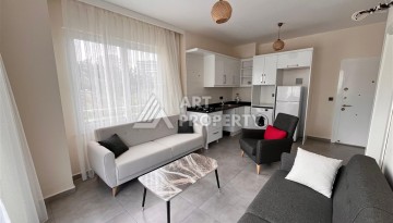 Квартира 1+1 в современной резиденции в Махмутларе, 50 кв.м. - Ракурс 26