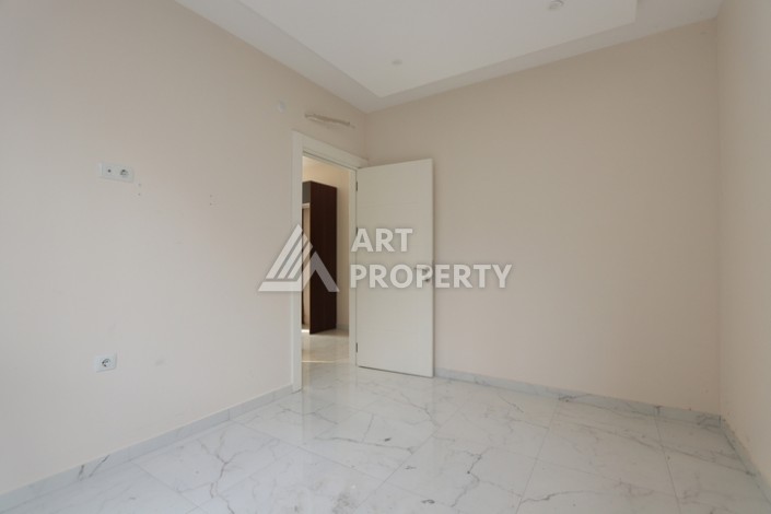 Недорогая квартира 1+1 в Махмутларе, 55 кв.м. - Ракурс 17