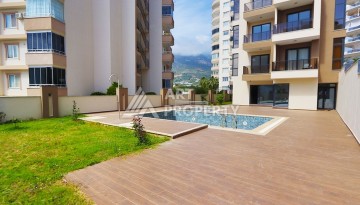 Недорогая квартира 1+1 в Махмутларе, 55 кв.м. - Ракурс 25