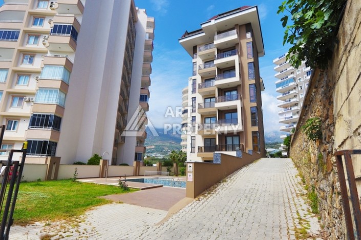 Недорогая квартира 1+1 в Махмутларе, 55 кв.м. - Ракурс 25