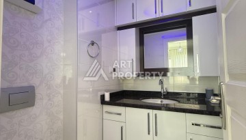 Элитная квартира 2+1 с панорамным видом на море в Махмутларе, 115 м² - Ракурс 22