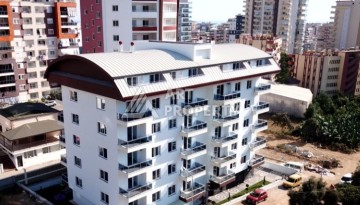 Квартира 1+1 в Махмутларе в доме 2021 года постройки в 700 метрах от моря - Ракурс 12