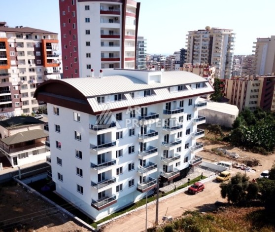 Квартира 1+1 в Махмутларе в доме 2021 года постройки в 700 метрах от моря - Ракурс 11