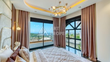 Современная вилла 5+1 с панорамным видом на море и гражданством Турции в Каргыджаке - Ракурс 17