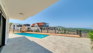 Современная вилла 5+1 с панорамным видом на море и гражданством Турции в Каргыджаке - Ракурс 23