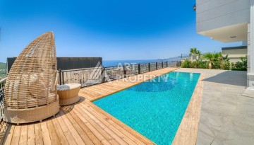 Современная вилла 5+1 с панорамным видом на море и гражданством Турции в Каргыджаке - Ракурс 29