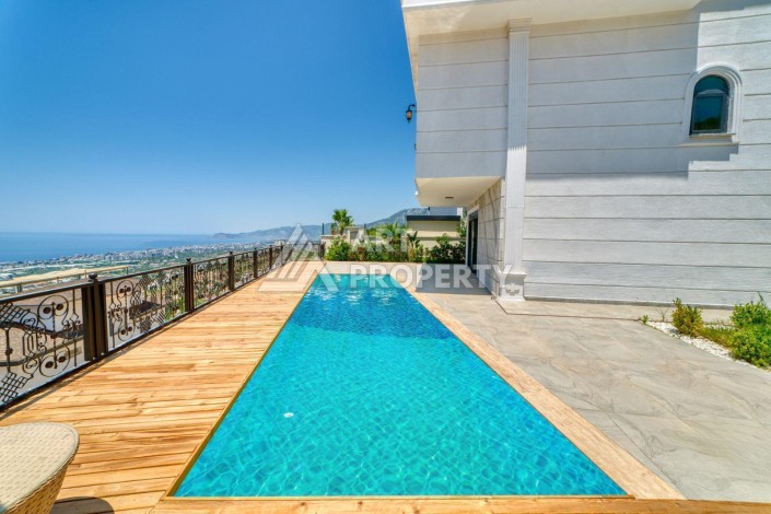 Современная вилла 5+1 с панорамным видом на море и гражданством Турции в Каргыджаке - Ракурс 29