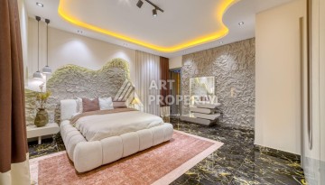 Современная вилла 5+1 с панорамным видом на море и гражданством Турции в Каргыджаке - Ракурс 32