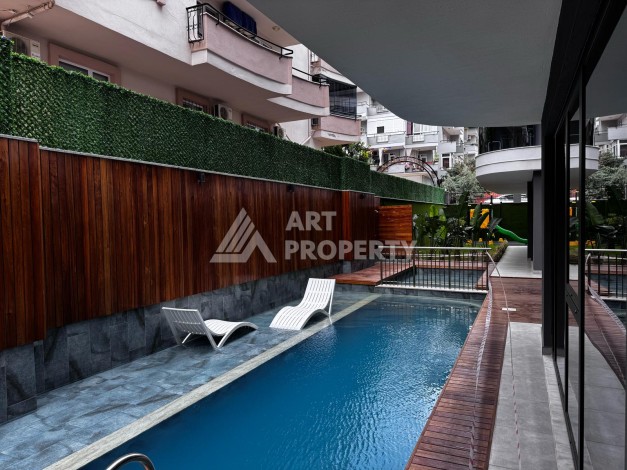 Квартира 2+1 в новом доме в районе Оба — 70 м², 400 м до моря, разрешение на краткосрочную аренду - Ракурс 25