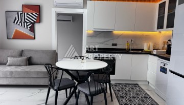 Квартира 2+1 в новом доме в районе Оба — 70 м², 400 м до моря, разрешение на краткосрочную аренду - Ракурс 32