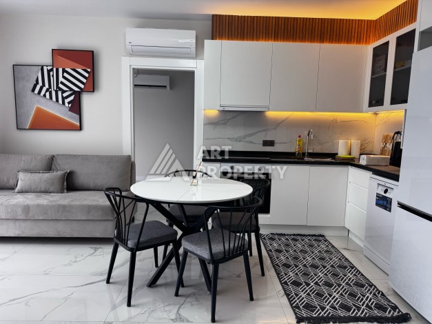 Квартира 2+1 в новом доме в районе Оба — 70 м², 400 м до моря, разрешение на краткосрочную аренду - Ракурс 31