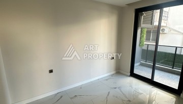 Квартира 2+1 в новом доме в районе Оба — 70 м², 400 м до моря, разрешение на краткосрочную аренду - Ракурс 35