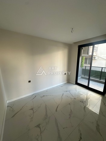 Квартира 2+1 в новом доме в районе Оба — 70 м², 400 м до моря, разрешение на краткосрочную аренду - Ракурс 34