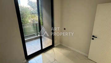 Квартира 2+1 в новом доме в районе Оба — 70 м², 400 м до моря, разрешение на краткосрочную аренду - Ракурс 36