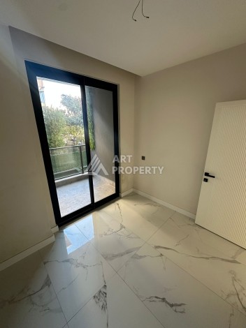 Квартира 2+1 в новом доме в районе Оба — 70 м², 400 м до моря, разрешение на краткосрочную аренду - Ракурс 35