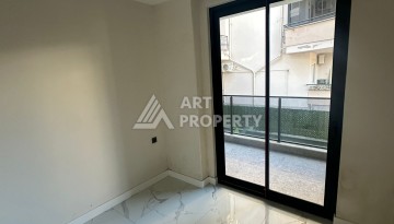 Квартира 2+1 в новом доме в районе Оба — 70 м², 400 м до моря, разрешение на краткосрочную аренду - Ракурс 37