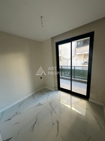 Квартира 2+1 в новом доме в районе Оба — 70 м², 400 м до моря, разрешение на краткосрочную аренду - Ракурс 36