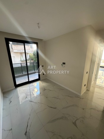 Квартира 2+1 в новом доме в районе Оба — 70 м², 400 м до моря, разрешение на краткосрочную аренду - Ракурс 37