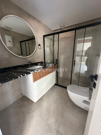 Квартира 2+1 в новом доме в районе Оба — 70 м², 400 м до моря, разрешение на краткосрочную аренду - Ракурс 38