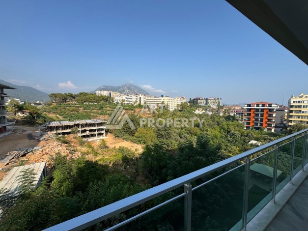 Большая квартира 1+1 в Кестеле, 75 кв.м. - Ракурс 6