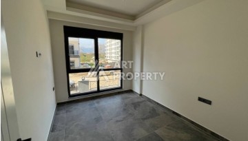 Новая квартира 1+1 в камерной резиденции, 50 кв.м. Махмутлар, Алания - Ракурс 14