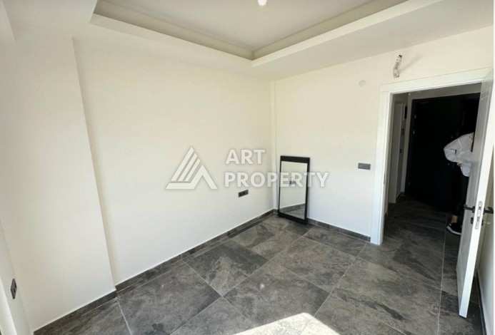 Новая квартира 1+1 в камерной резиденции, 50 кв.м. Махмутлар, Алания - Ракурс 15