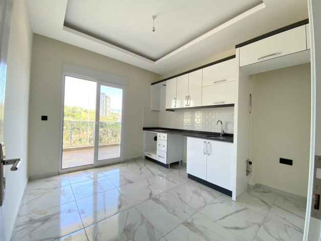 Две квартиры 3+1 в новом доме с инфраструктурой в районе Махмутлар,  150 м2 - Ракурс 11