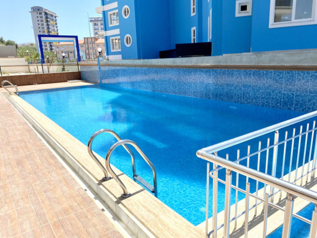 Две квартиры 3+1 в новом доме с инфраструктурой в районе Махмутлар,  150 м2 - Ракурс 18