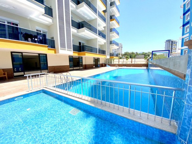 Две квартиры 3+1 в новом доме с инфраструктурой в районе Махмутлар,  150 м2 - Ракурс 19