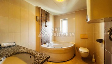 Квартира 2+1 в популярной резиденции на ул.Ататюрка в Махмутларе, 120 кв.м. - Ракурс 45