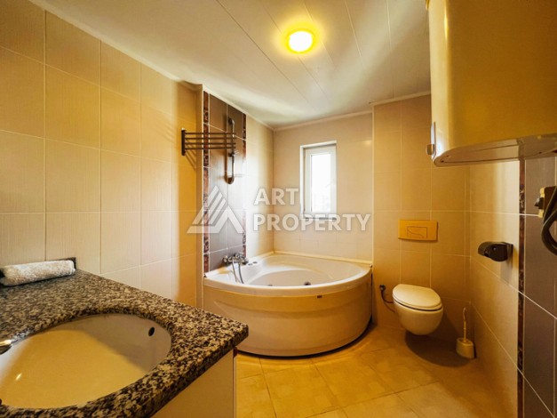 Квартира 2+1 в популярной резиденции на ул.Ататюрка в Махмутларе, 120 кв.м. - Ракурс 44