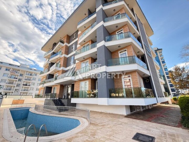 Квартира 1+1 в новом комплексе 2024 года в Махмутларе, 55 м², 700 метров до моря - Ракурс 1