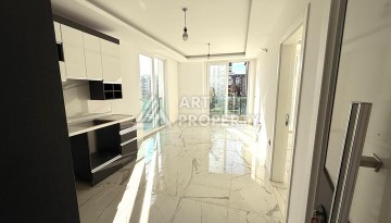 Квартира 1+1 в новом комплексе 2024 года в Махмутларе, 55 м², 700 метров до моря - Ракурс 4