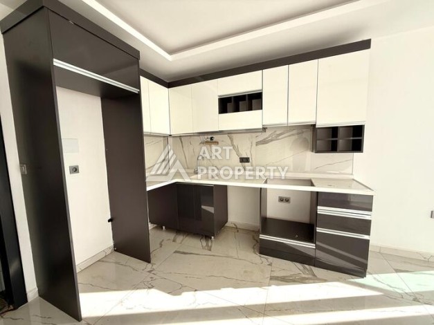 Квартира 1+1 в новом комплексе 2024 года в Махмутларе, 55 м², 700 метров до моря - Ракурс 4