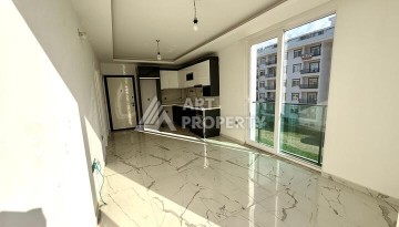 Квартира 1+1 в новом комплексе 2024 года в Махмутларе, 55 м², 700 метров до моря - Ракурс 6