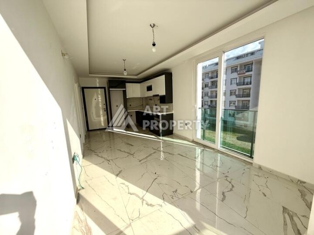 Квартира 1+1 в новом комплексе 2024 года в Махмутларе, 55 м², 700 метров до моря - Ракурс 5